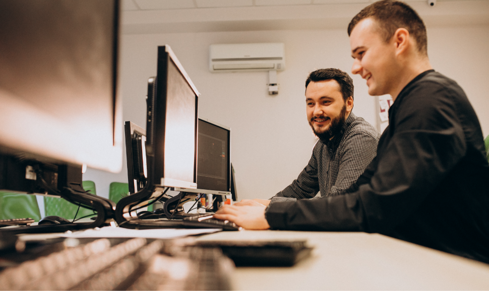 young-male-web-designers-working-computer