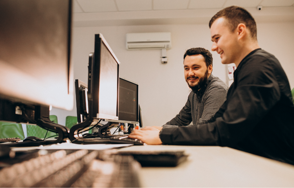 young-male-web-designers-working-computer